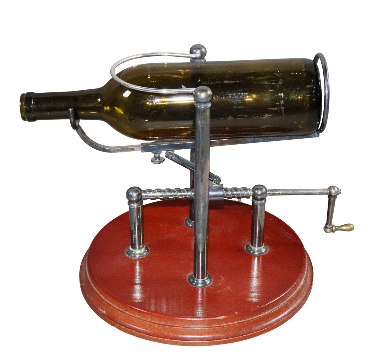 French mechanical wine bottle pourer: French mechanical wine bottle pourer. Mid 20th century. 10"h x 11 3/8"w x 10"d. Weight 3lbs