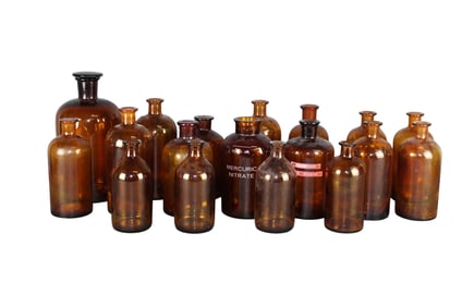 Lot of 17 French amber glass pharmacy bottles