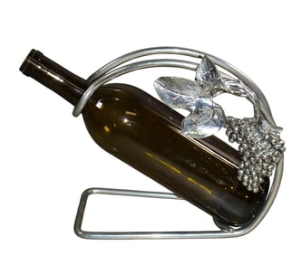 French wine pourer with grapes in relief