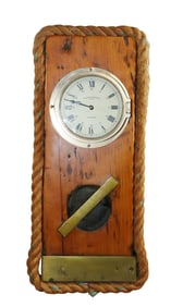 Emory & Douglas brass ship's clock mounted on ship hatch