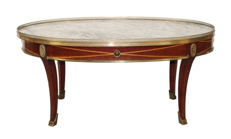 French Louis XVI style oval coffee table with marble top and brass gallery