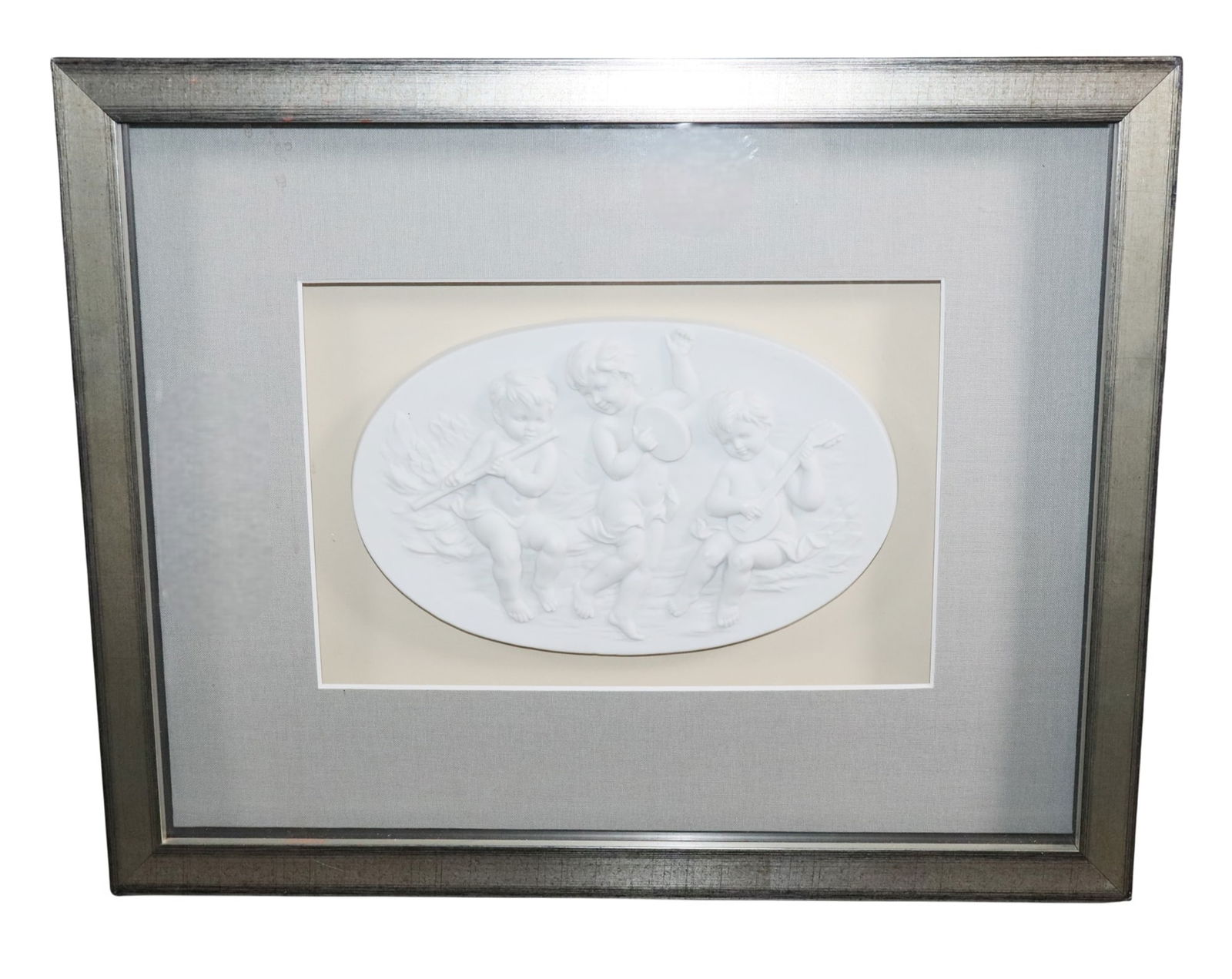 Italian cast plaster relief plaque with cherubs in shadowbox frame: Italian cast plaster relief plaque with cherubs in shadowbox frame. 12 3/4"h x 15 7/i8"w