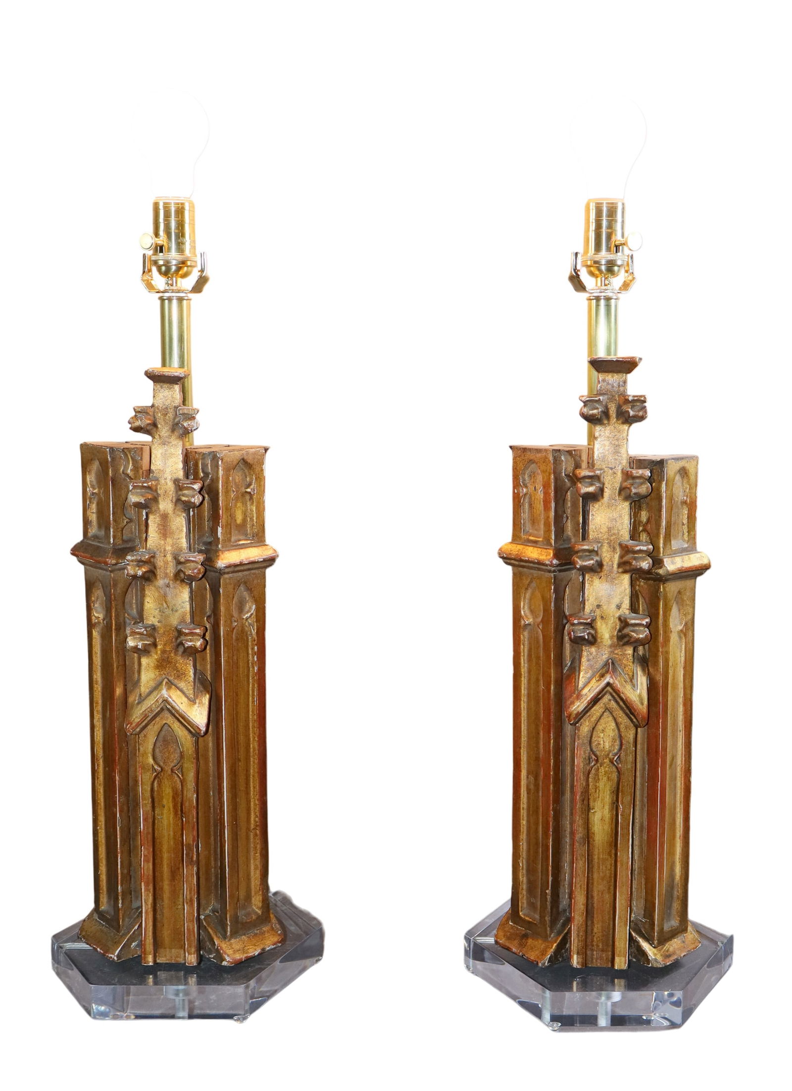 Pair of French Gothic Revival gilt wood fragment lamps: Pair of French Gothic Revival gilt wood fragment lamps. 19th century fragments later mounted on Lucite bases as lamps. 25"h x 9 1/2"w x 9 1/2"d. Weight: 16 lbs. total