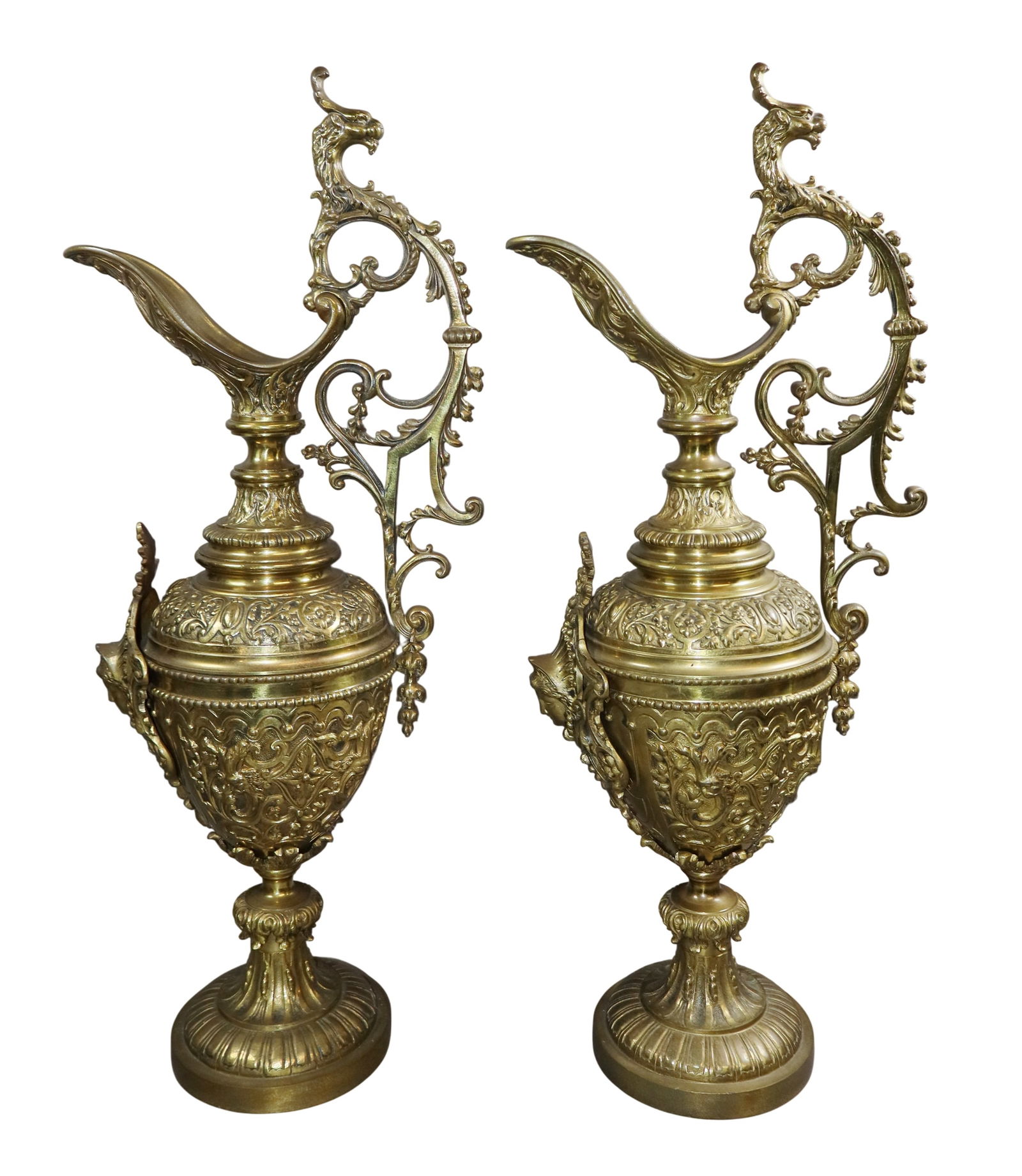 Pair of large scale bronze ewers: Pair of large scale bronze ewers. 29"h x 7 1/4"w x 11 1/2"d. Weight: 41 lbs. total