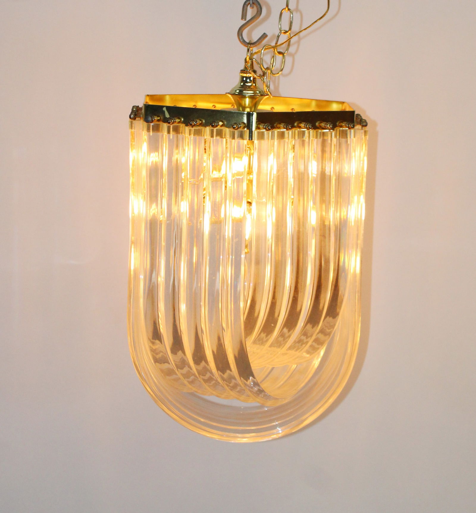 Mid Century Modern Lucite ribbon chandelier: Mid Century Modern Lucite ribbon chandelier after Carlo Nason. 22"h x 15"w