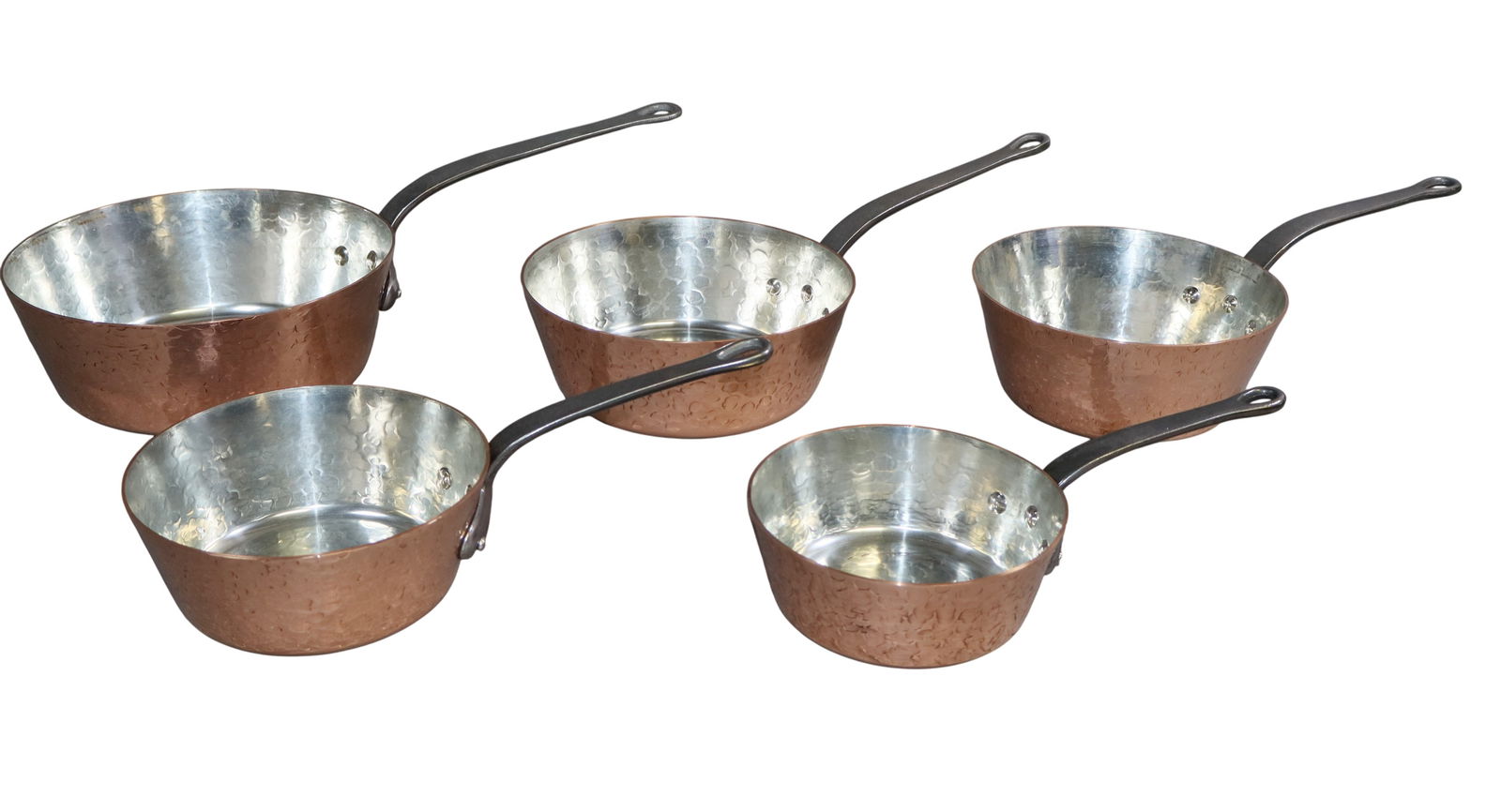 Set of 5 antique French copper pots, hammered, Villedieu France: Set of 5 antique French copper pots, hammered, Villedieu France. Ranging in size from largest 5 1/4"h x 20"w x 9 3/4"d to smallest 3 3/4"h x 12 5/8"w x 6 1/2"dia. Weight: 28lbs total