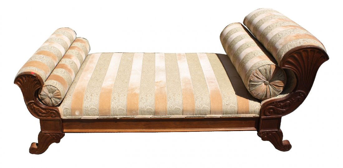 Chaise lounge in mahogany frame: carved in a fan motif. 31"h x 74"l x 36"d