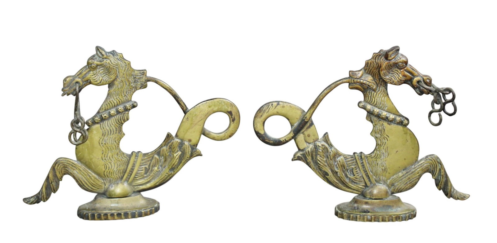 Pair of Venetian brass seahorse form oak locks: Pair of Venetian brass seahorse form oak locks. 9"h x 12"w overall. Weight: 5lbs