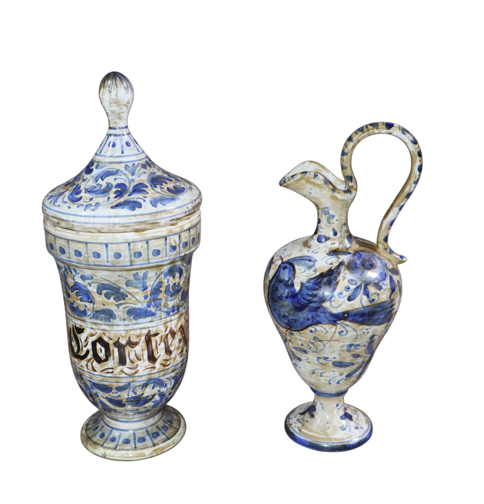 Lot of 2 Italian Guerrieri Murano ceramic pharmacy jar and pitcher: Lot of 2 Italian Guerrieri Murano ceramic pharmacy jar and pitcher 9"h x 3 5/8"dia , 8"h x 3"dia. Weight: 1lb total
