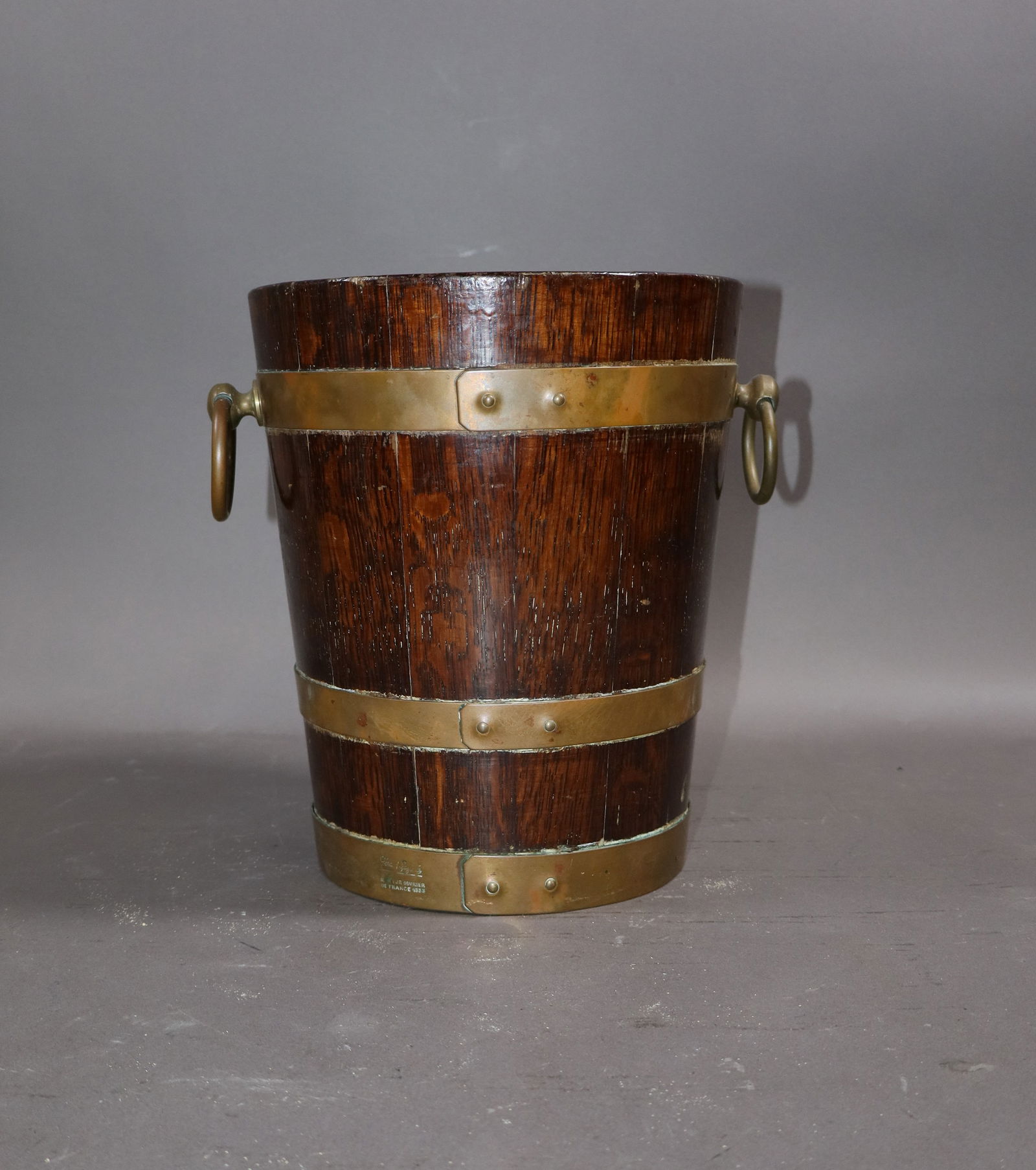 French Gerard LaFitte oak and brass banded wine bucket: French Gerard Lafitte oak and brass banded wine bucket. 9 1/2"h x 8"dia. Weight: 4lbs