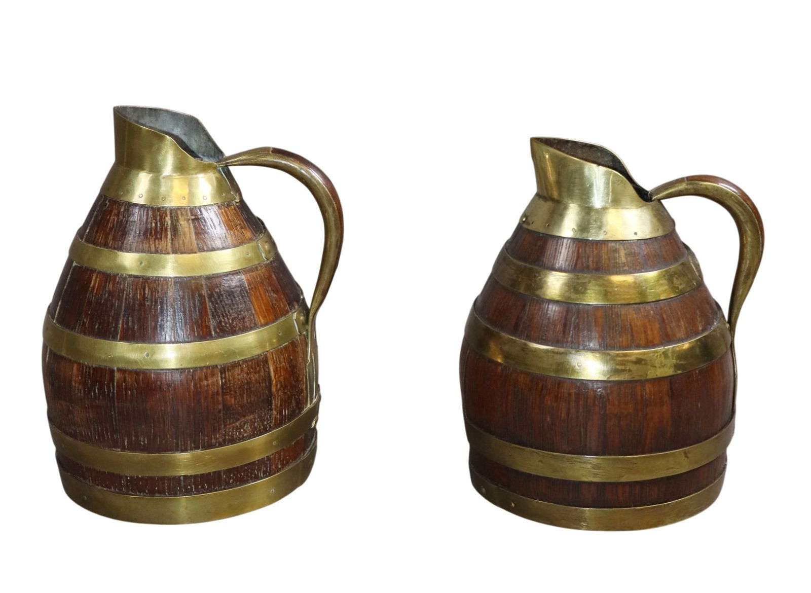 Lot of 2 mini French Alsatian oak and brass banded wine pitchers: Lot of 2 mini French Alsatian oak and brass banded wine pitchers. 8"h x 5 1/8"dia - 7 1/2"h x 5 1/8"dia Weight: 2lbs total