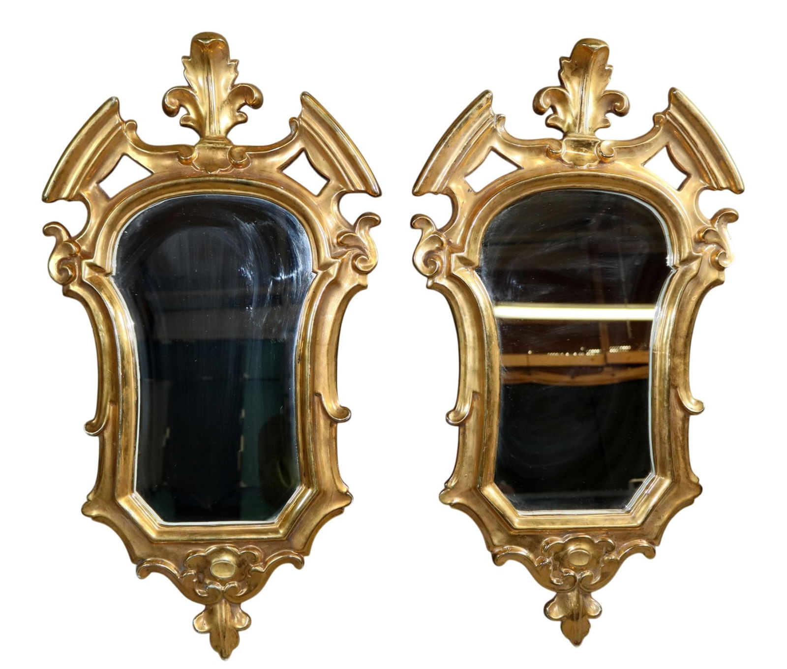 Pair of Italian porcelain shield form mirrors: Pair of Italian porcelain shield form mirrors. Mid 20th century. 24 1/2"h x 13 1/2"w, weight: 10lbs