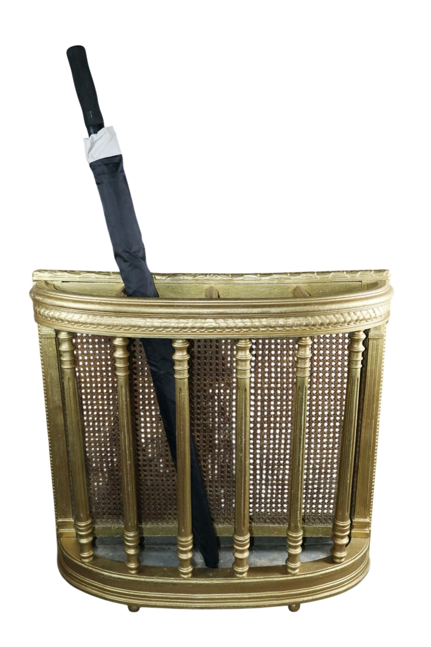 French Louis XVI style gilt wood umbrella stand: French Louis XVI style gilt wood umbrella stand. Curved front with fluted columns and a cane back. Zinc pan at bottom. Late 19th century. 27 1/4"h x 28 1/8"w x 7 3/8"d. Weight: 5.5lbs