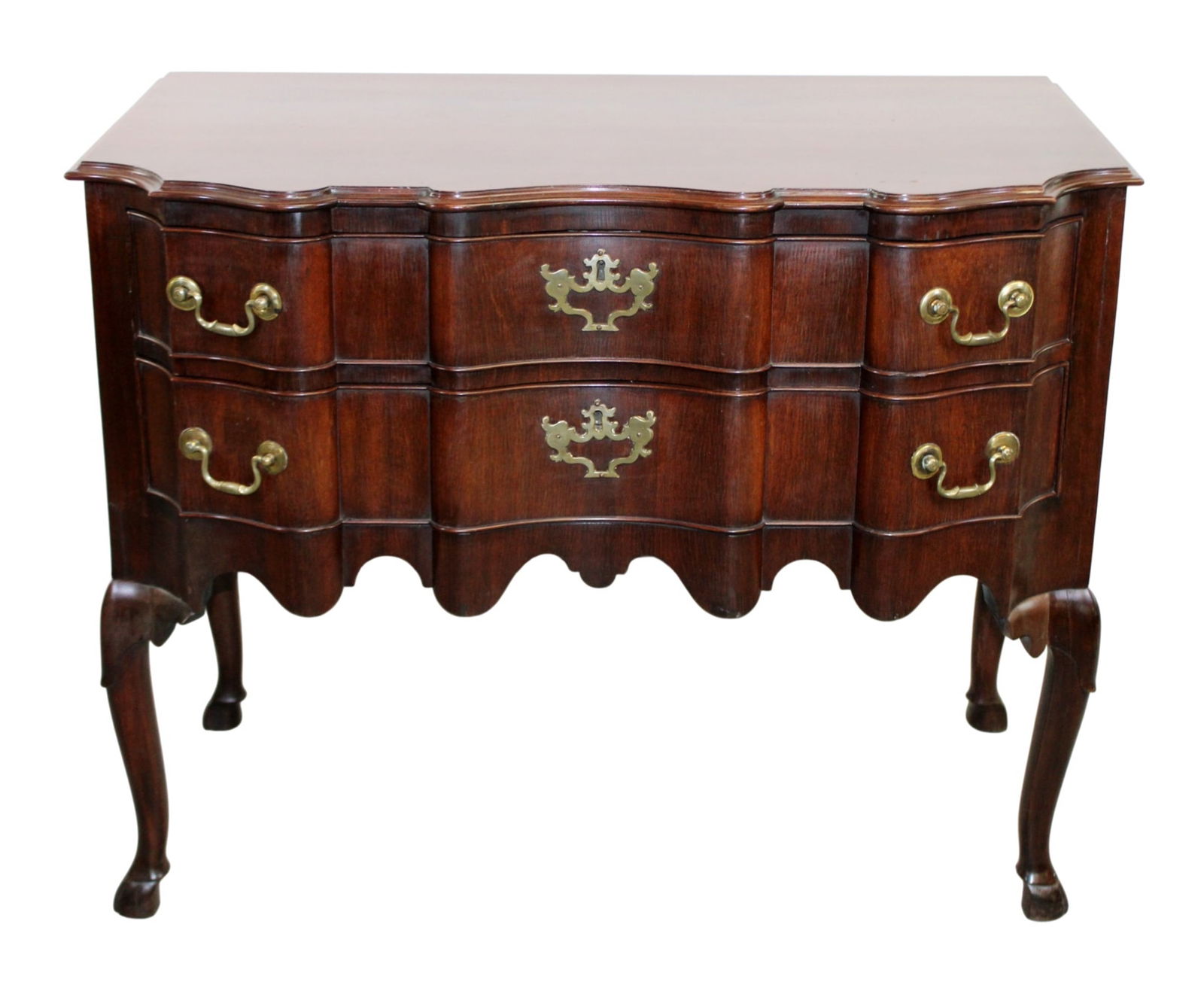 French 2 drawer commode in walnut on legs with hoof feet: French 2 drawer commode in walnut on legs with hoof feet. Late 19th century. 32"h x 39 1/2"w x 22"d