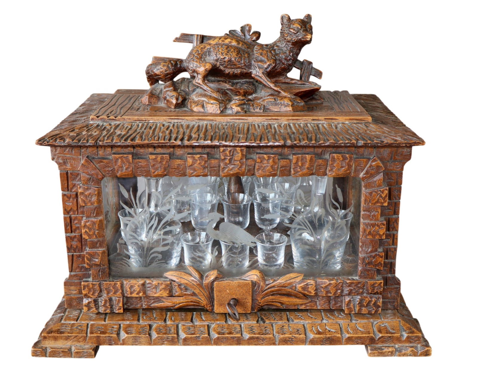 Black Forest carved walnut tantalus box with fox: Black Forest carved walnut tantalus box with fox on top. Late 19th century. 14 1/2"h x 17 1/4"w x 12 5/8"d. Weight:15lbs