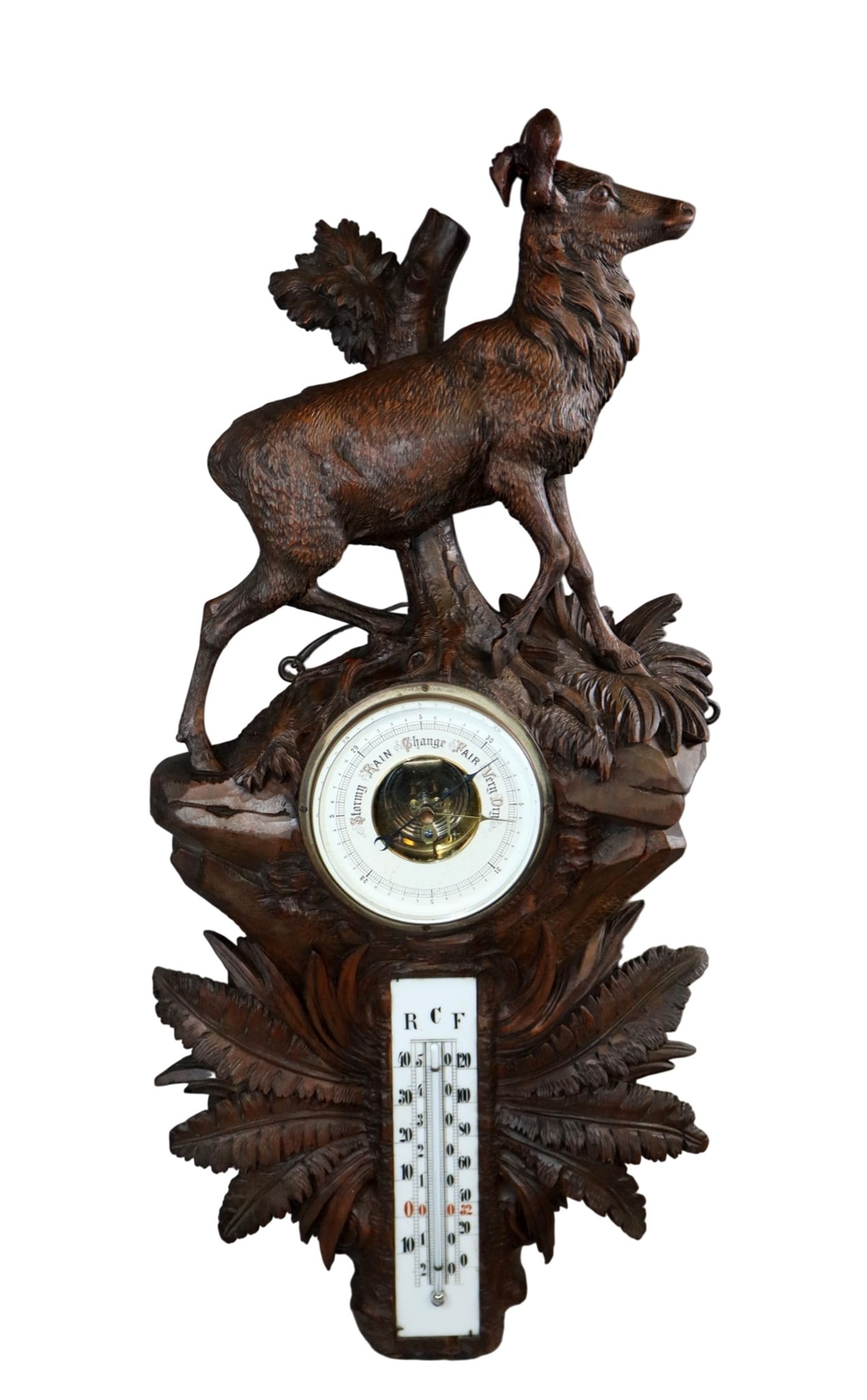 Black Forest relief carved barometer with deer: Black Forest relief carved barometer with deer in walnut. Late 19th century. Overall size 29"h x 13"w. Weight: 8lbs