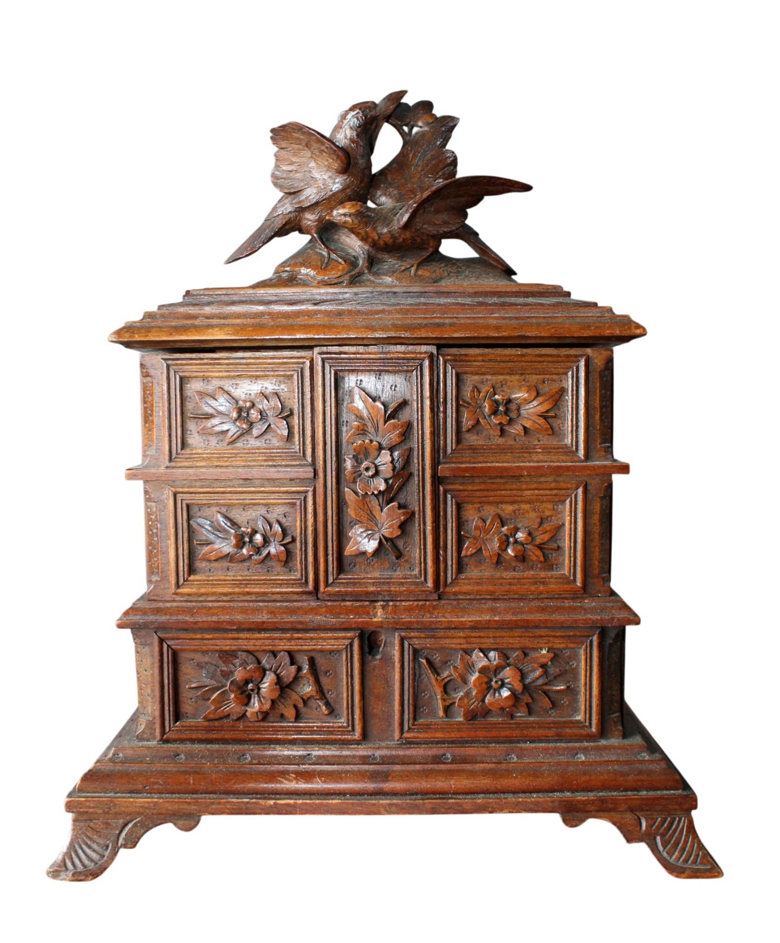 Black Forest carved walnut dresser box with birds: Black Forest carved walnut dresser box with birds. Late 19th century. 14"h x 10 1/4"w x 5 1/4"d. Weight: 3lbs