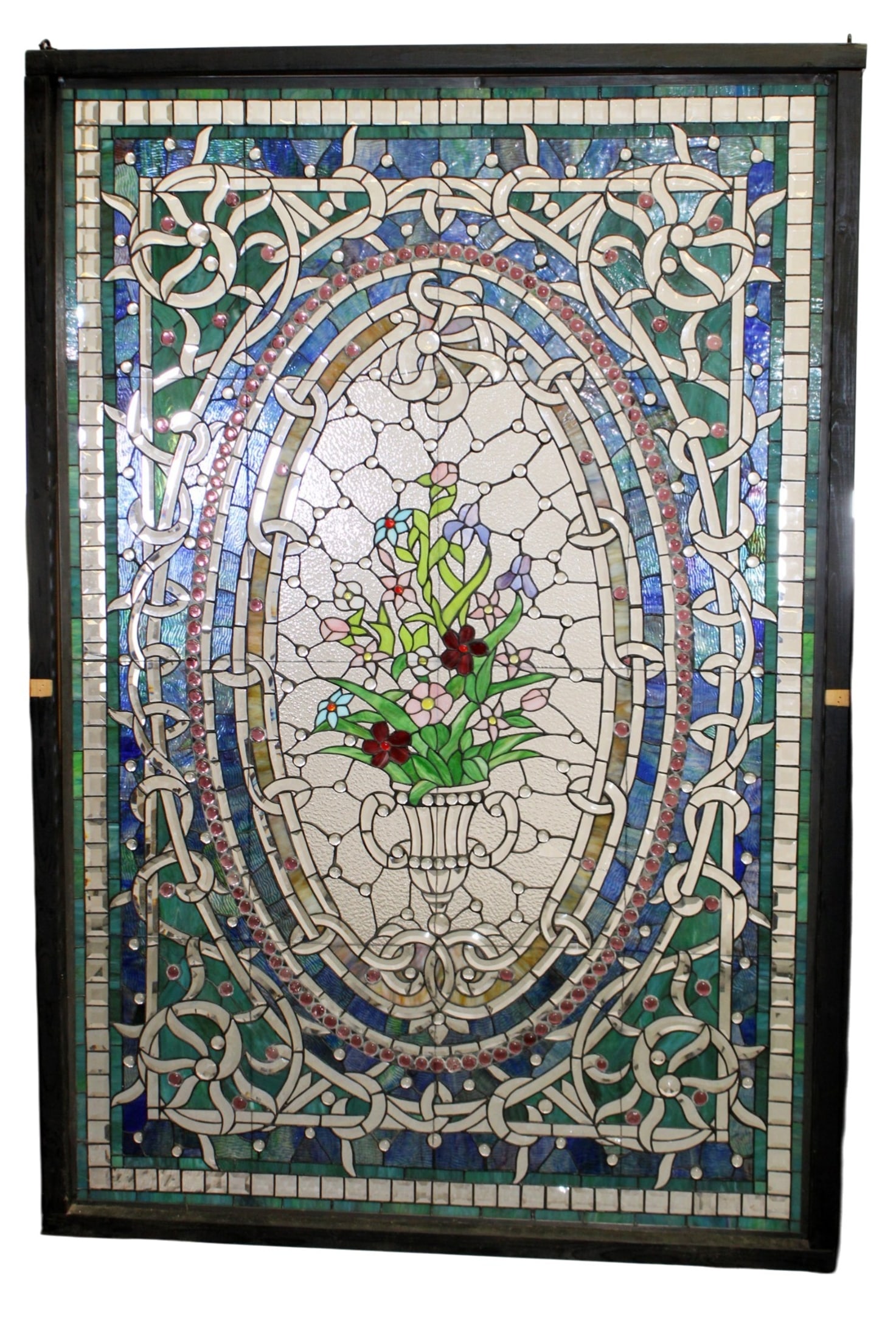 Stained , beveled and jeweled glass landing window with floral motif: Stained , beveled and jeweled glass landing window with floral motif. glass measures 70 3/4"h x 46 3/4"w