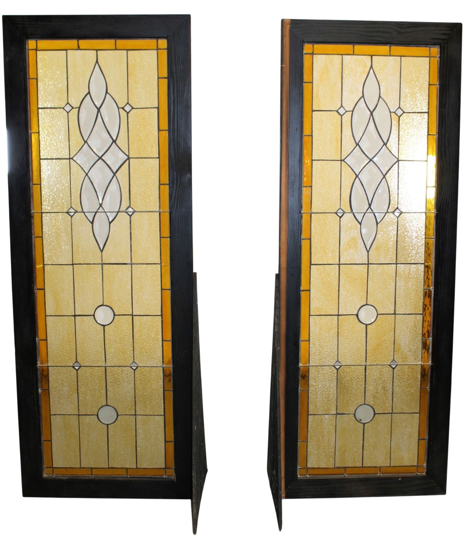 Pair of American stained and beveled glass windows: Pair of American stained and beveled glass windows. In 72 1/2 x 27