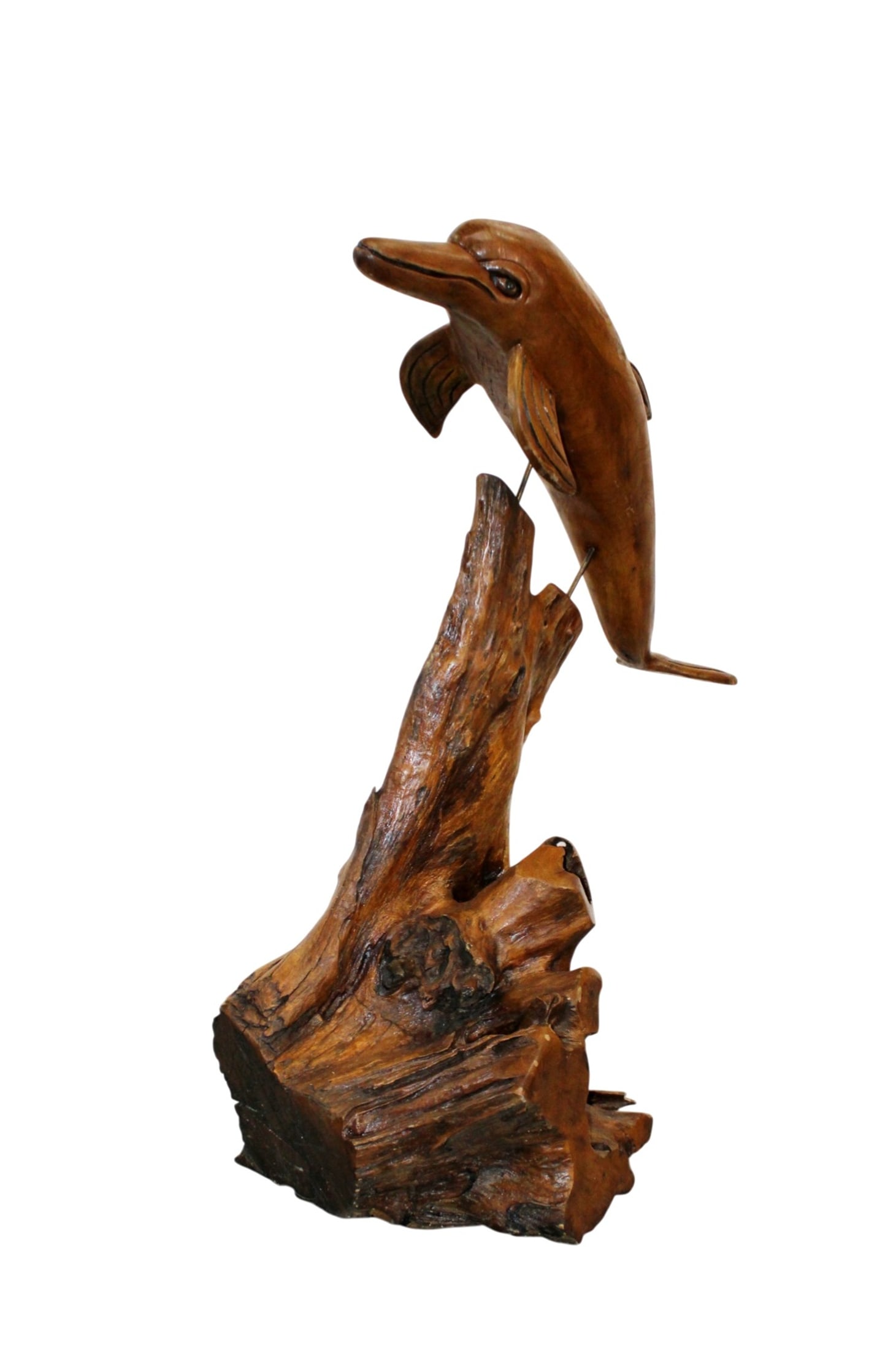 Carved teak dolphin sculpture mounted on redwood stand: Carved teak dolphin sculpture mounted on redwood stand. 44"h x 34"w x 28"d