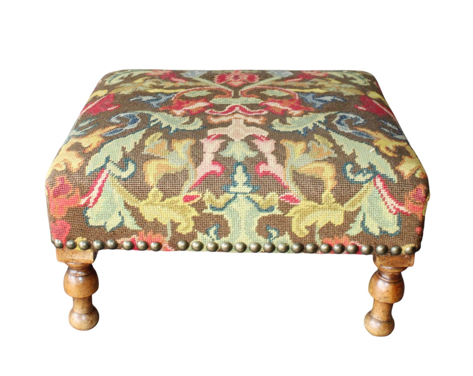 French wooden footstool with floral tapestry upholstery: French wooden footstool with floral tapestry upholstery. Late 19th century. 9"h x 16 1/2"w x 14 3/4"d. Weight: 7lbs