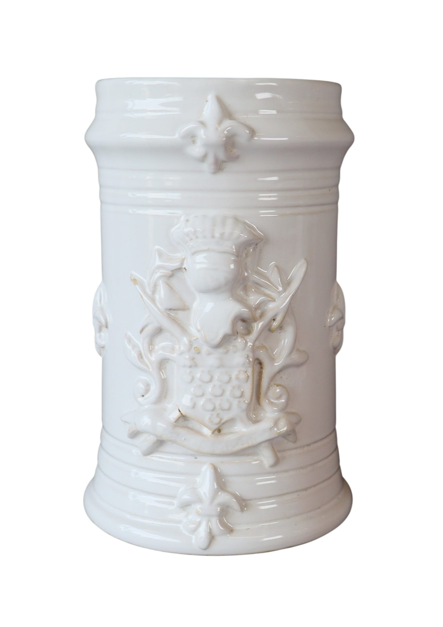 French glazed ceramic vase or wine bottle holder with raised coat of arms: French glazed ceramic vase or wine bottle holder with raised coat of arms and fleur de Lys. 8 1/2"h x 5 1/2" dia. Weight: 2lbs