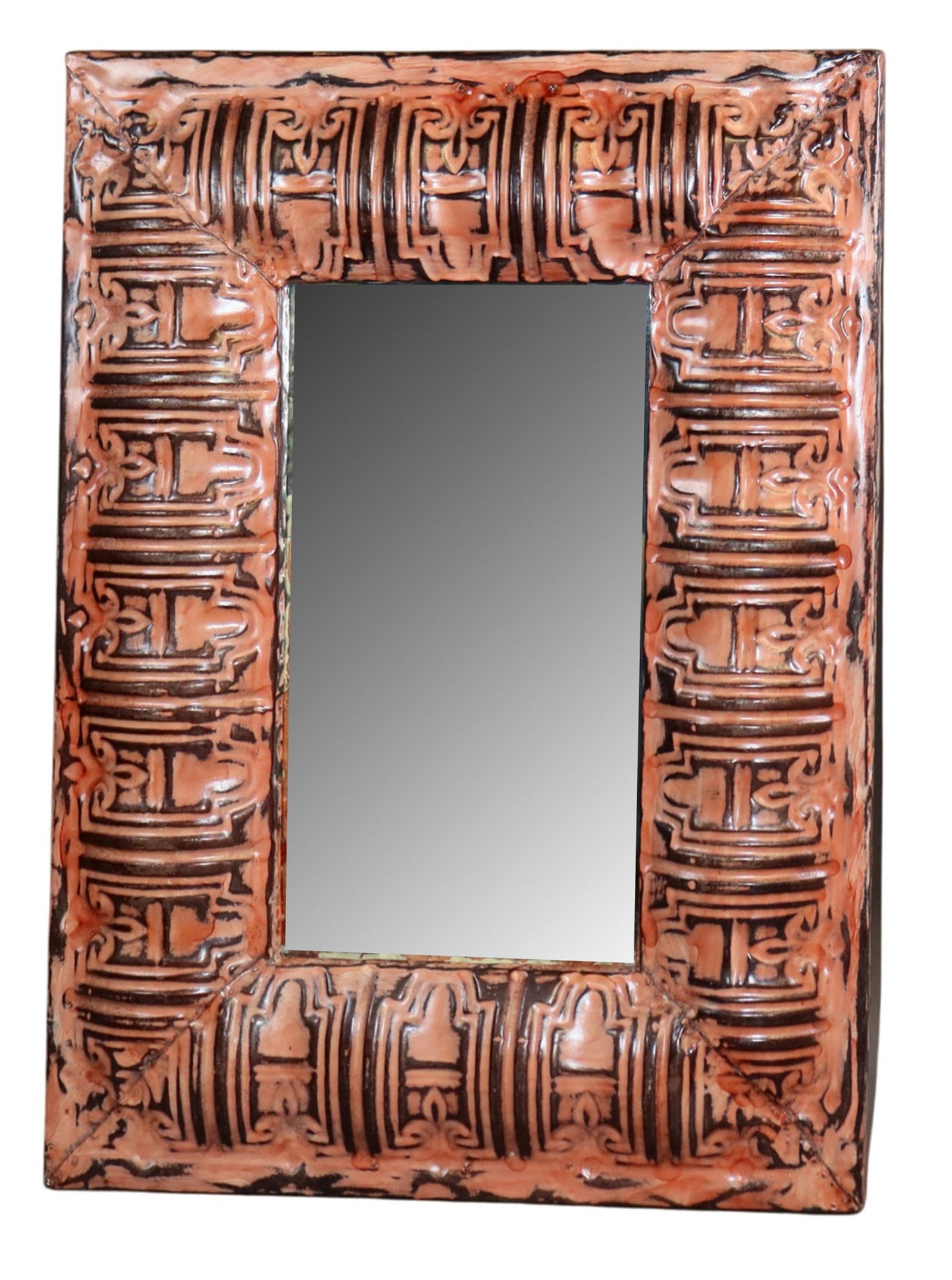 Reclaimed ceiling tin framed mirror: Reclaimed ceiling tin framed mirror. Made in the USA. 22 1/2"h x 16 1/2"w overall. Weight: 8lbs