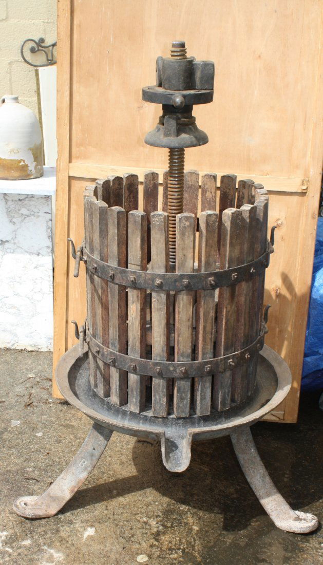 Antique iron and wood wine press