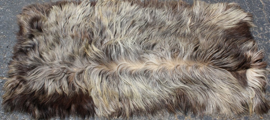 Mongolian goat skin rug: 67"x 25"