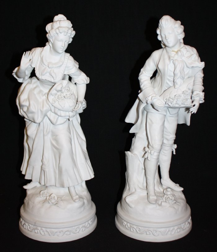 Pair of Bisque figural statues: marked 23/94 Wb, 16 1/2"h. 19th century. Possibly German.