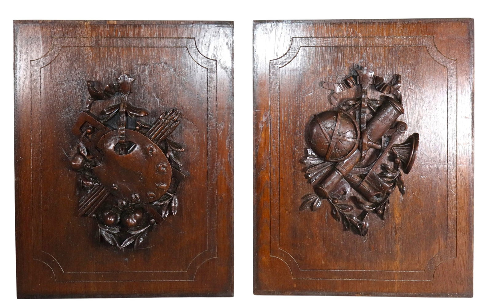 Lot of 2 French panels with relief carved attributes of the arts: Lot of 2 French panels with relief carved attributes of the arts. Late 19th century. 21 1/8"h x 16 1/2"w. Weight: 6lbs total