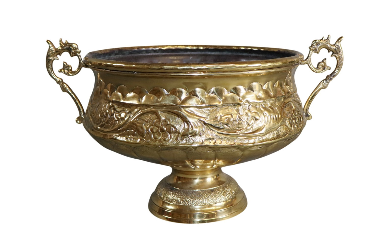 French embossed brass jardiniere with handles: French embossed brass jardiniere with handles. Early 20th century. 8.5"h x 14.5"w x 10.5"dia. Weight: 3lbs