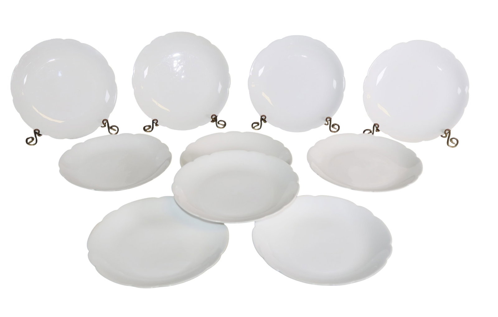Set of 12 Haviland France porcelain dessert plates: Set of 12 Haviland France porcelain dessert plates with scalloped edges. 1"h x 7 3/8"dia. Weight: 4.5lbs total