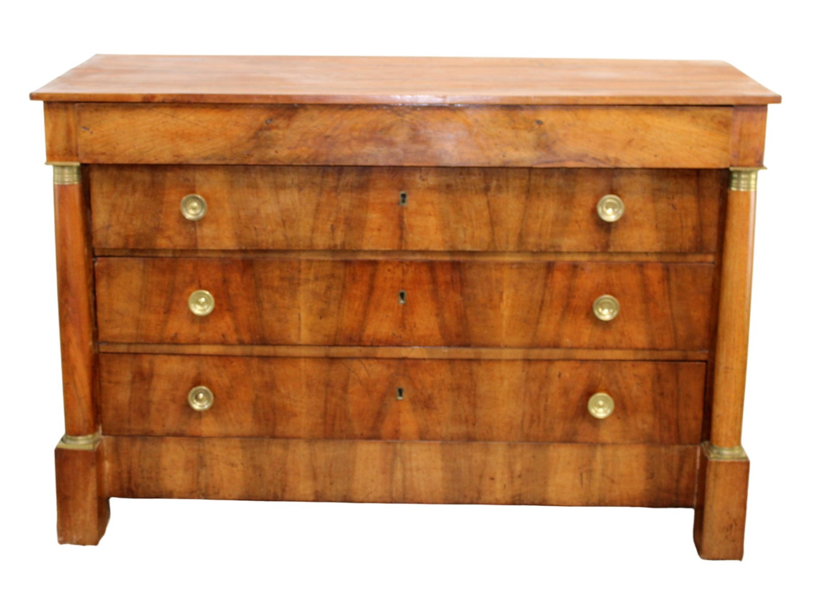 Oversize French Empire commode in walnut with columns: Oversize French Empire commode in walnut with columns. 19th century. 37 1/2"h x 56 1/4"w x 23 1/4"d