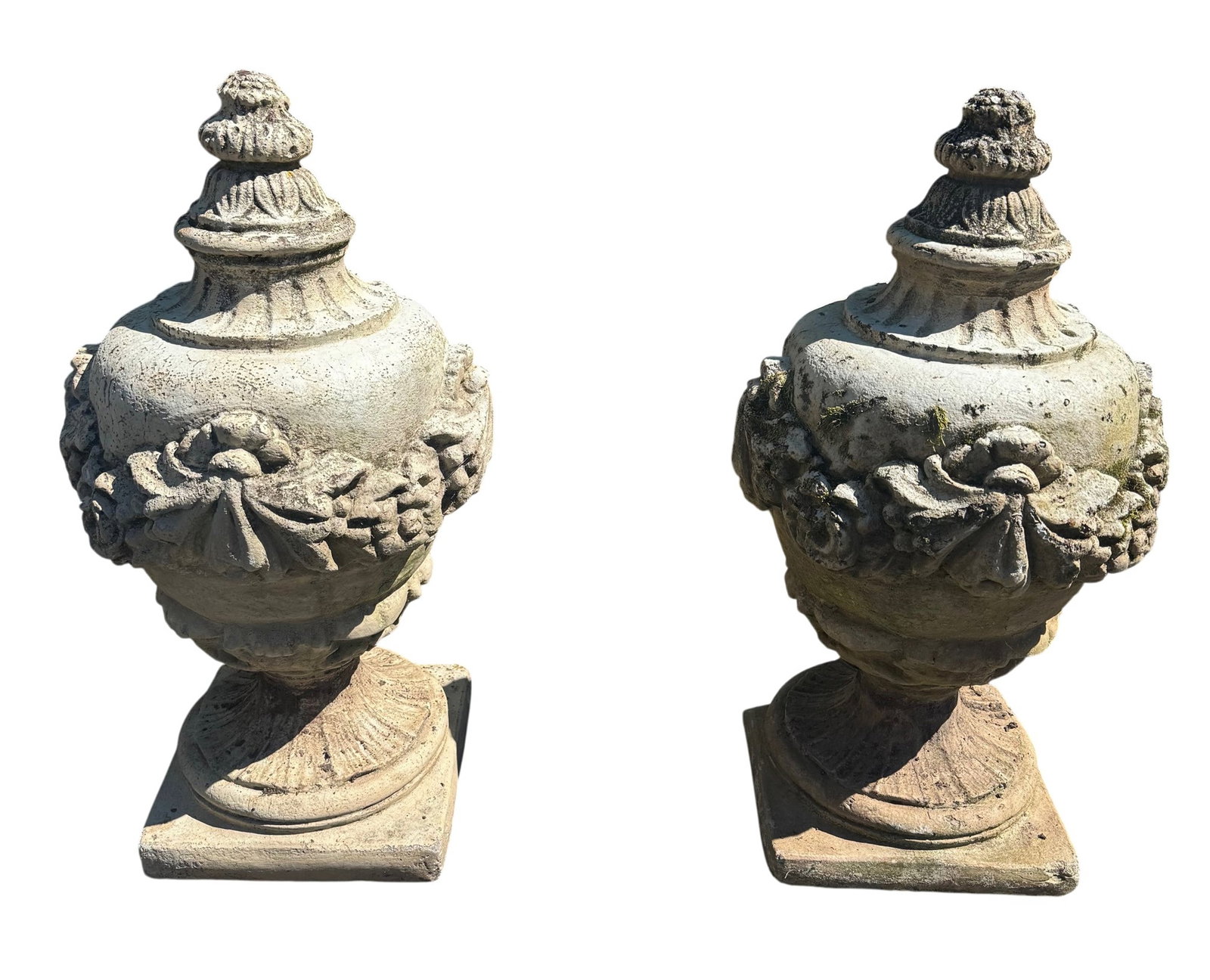 Pair of cast garden stone cassoulets: Pair of cast garden stone cassolettes with floral garland. 24"h x 13"w overall