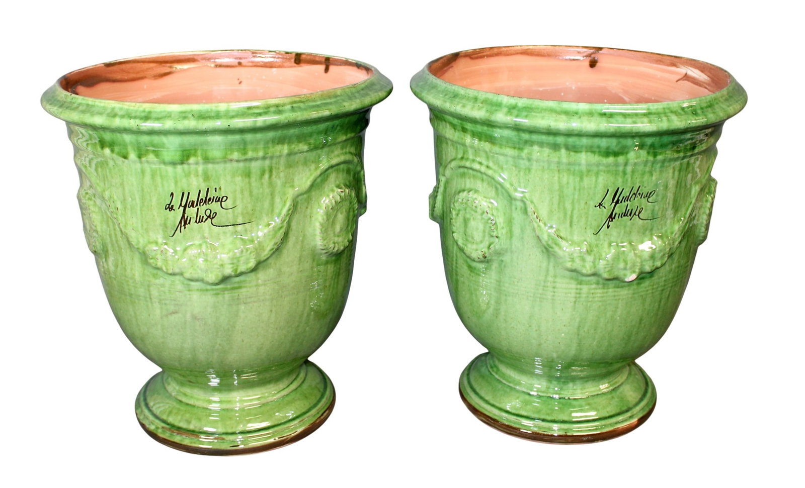 Pair of French Anduze La Madeleine glazed urns: Pair of French Anduze glazed terra cotta planters. Marked La Madeleine Anduze. 17"h x 15 1/2"dia. Weight: 25 lbs each