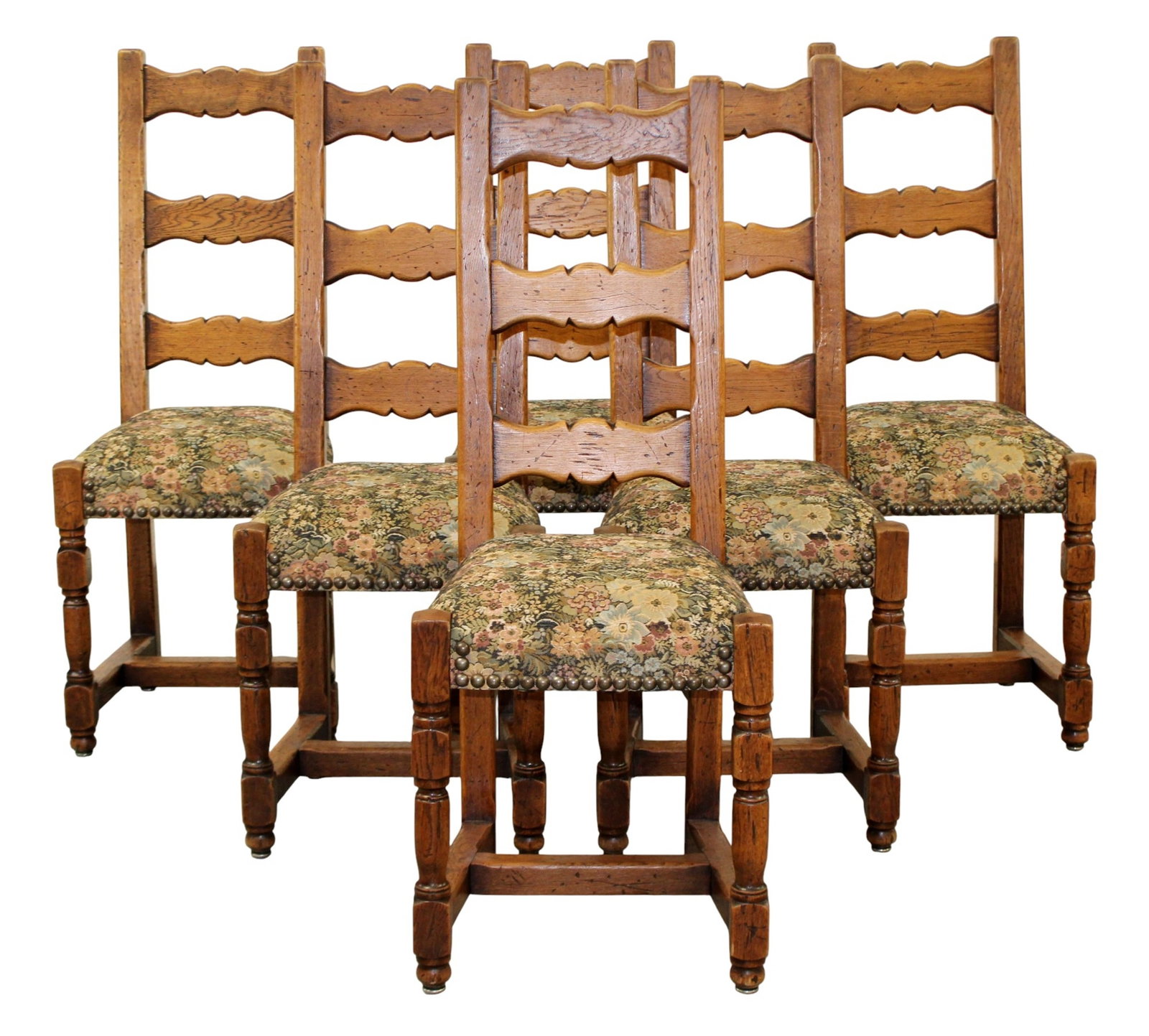 Lot of 6 French ladder back chairs. In oak with floral tapestry seats.: Lot of 6 French ladder back chairs. In oak with floral tapestry seats. Mid 20th century. Each: 43 1/2"h x 17"w x 18 1/2"d, seat: 20 3/8"h