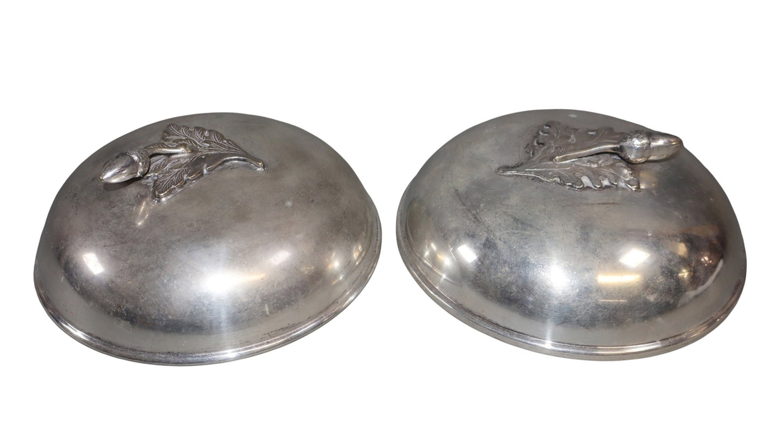 Lot of 2 French silver plated cheese cloches with acorn handles: Lot of 2 French silver plated cheese cloches with acorn handles. Circa 1900. 2 1/2"h x 6 3/3"dia. Weight: less thank 1lb