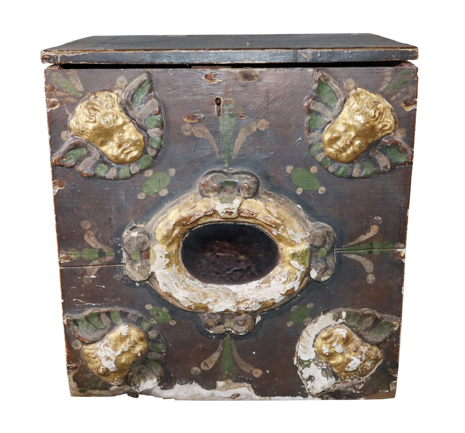 Italian painted reliquary box with relief putti: Italian painted reliquary box with relief putti. 19th century. 14 1/4"h x 13 1/4"w x 9 1/4"d. Weight: 5lbs