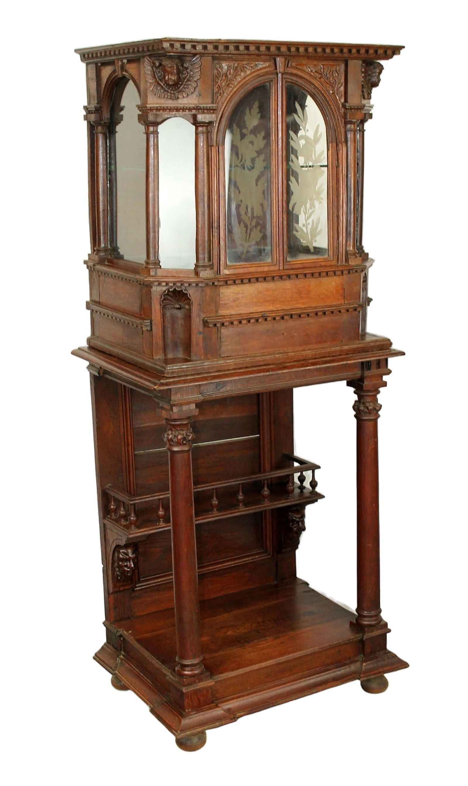 French altar curio cabinet in carved oak: French altar curio cabinet in carved oak with cherubs. Etched glass doors. 19th century. 64 1/2"h x 27 1/2"w x 19"d