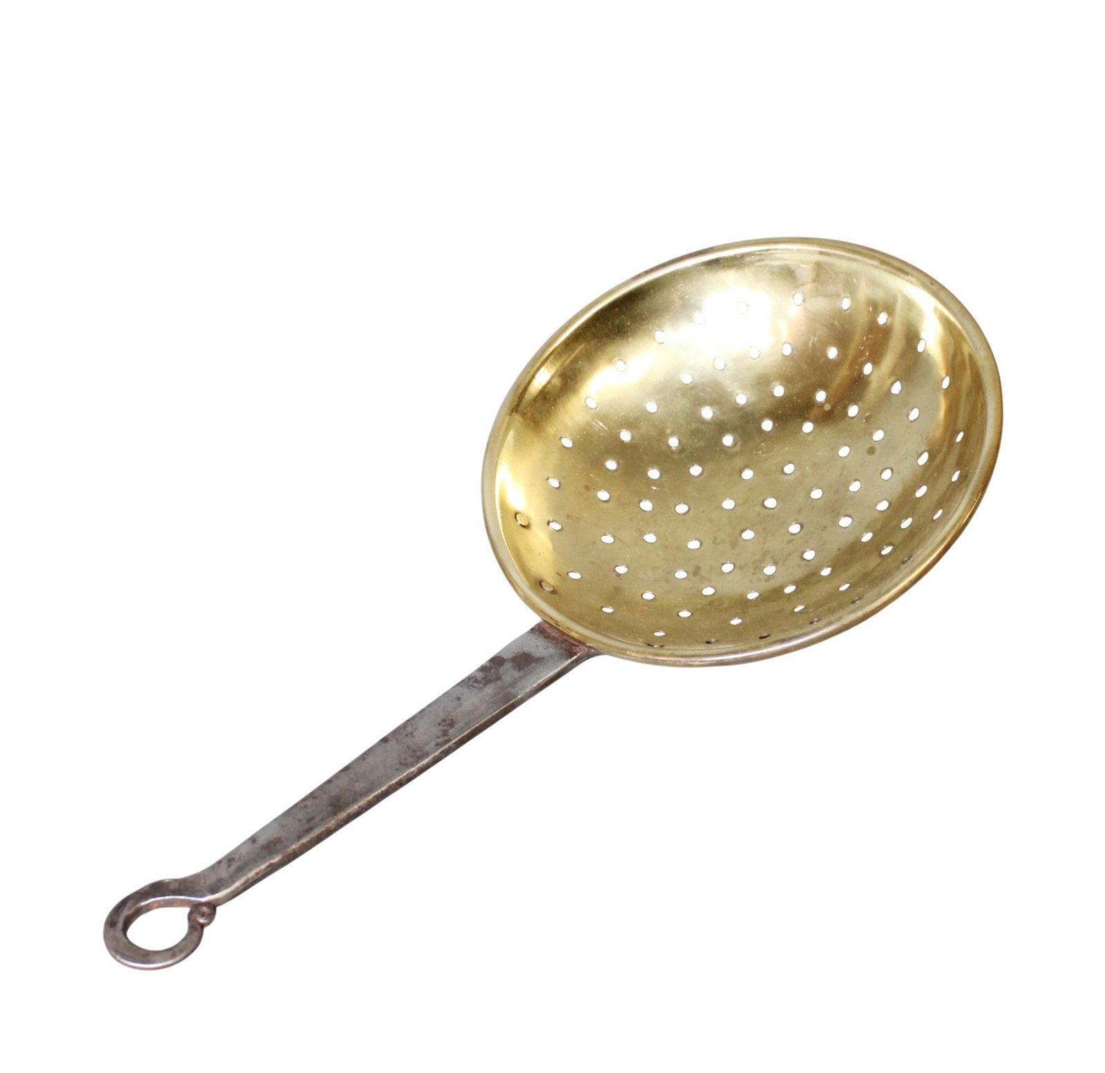 French brass slotted spoon with iron handle: French brass slotted spoon with iron handle. 19th century. 16 1/2" x 8 1/2"w. Weight: 2lbs