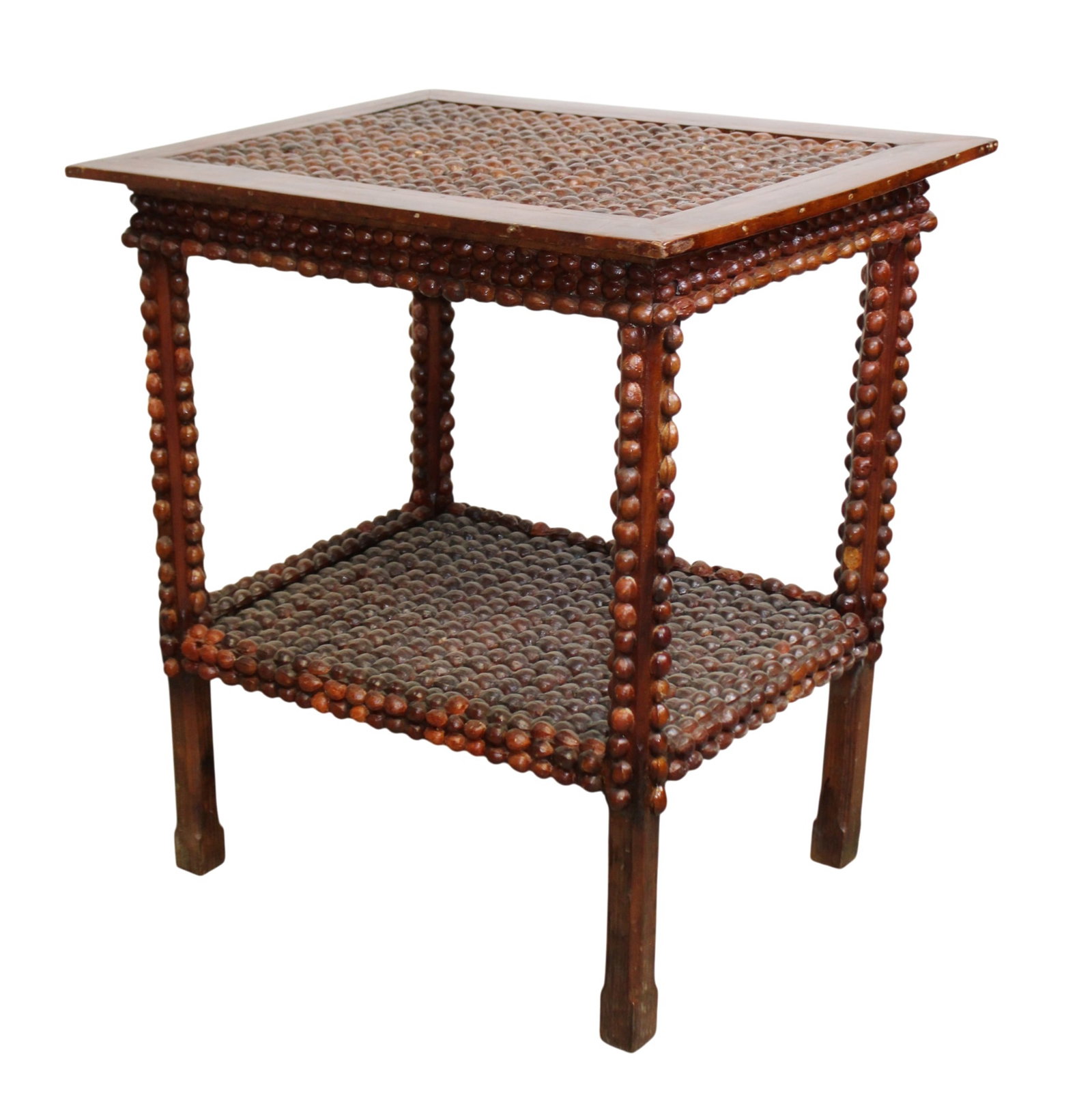 Folk Art tiered side table with chestnuts: Folk Art tiered side table with chestnuts. Early 20th century. 31"h x 29 1/8"w x 22 1/2"d