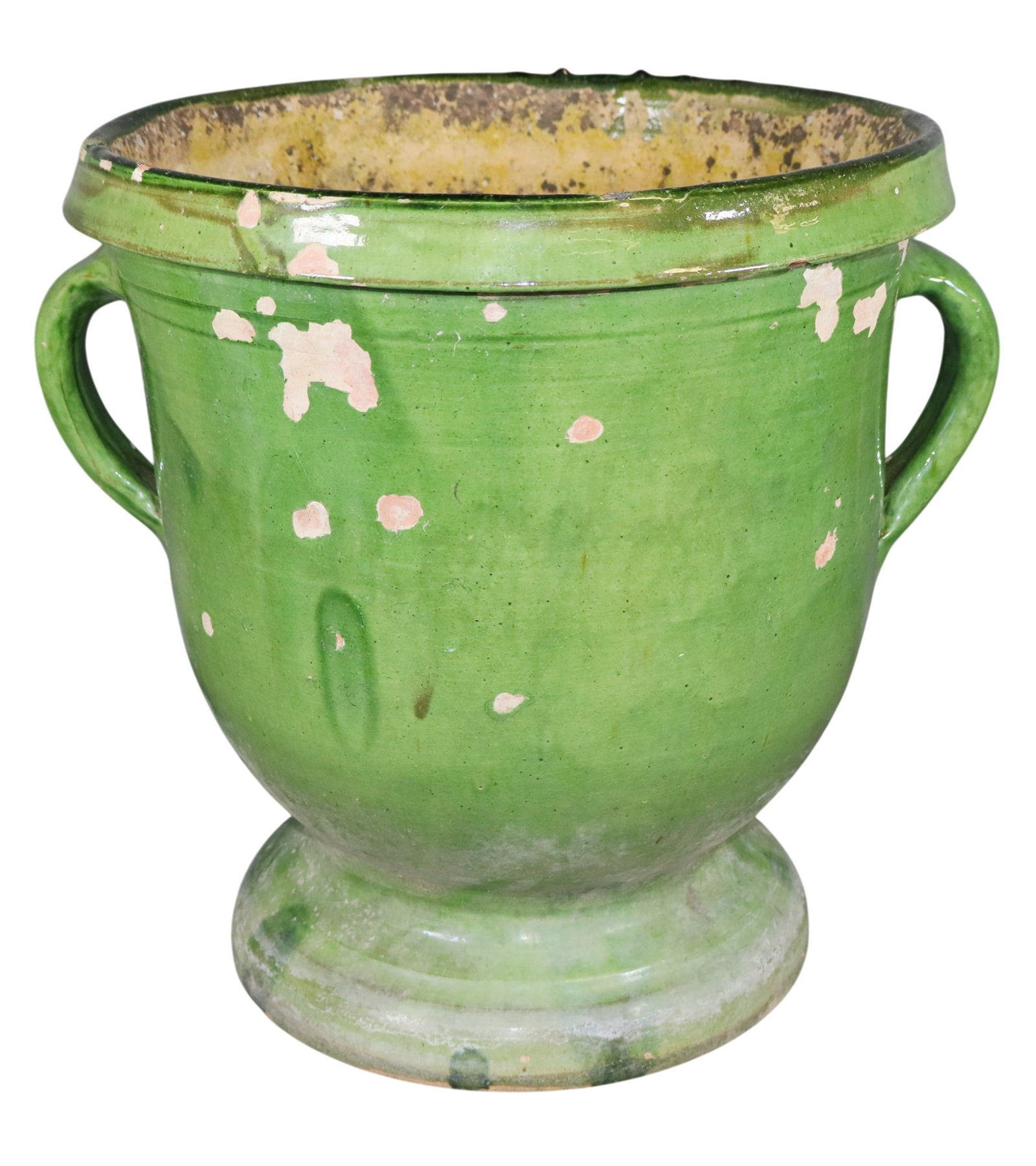 Large French Castelnaudary glazed terra cotta double handled urn in green glaze: Large French Castelnaudary glazed terra cotta double handled urn in green glaze. 15 1/2"h x 16"w x144 3/4"dia Weight: 23lbs