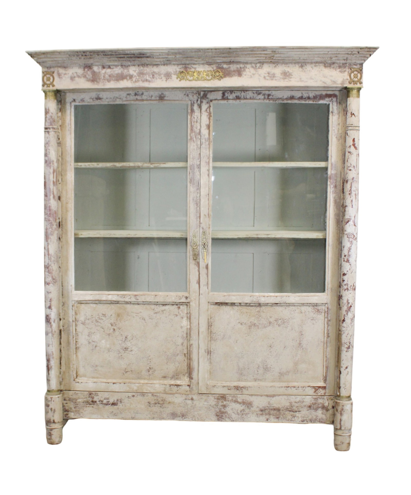 French Empire 2 door painted and distressed bookcase with columns: French Empire 2 door painted and distressed bookcase with columns. Late 19th century. 72"h x 61 5/8"w x 19"d