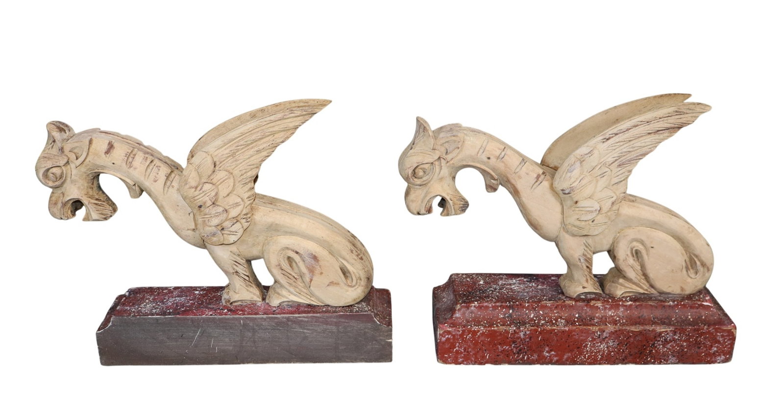 Pair of French carved griffins mounted on faux marble painted wood bases: Pair of French carved griffins mounted on faux marble painted wood bases. Late 19th century. 8 3/4"h x 2 3/4"w x 10 1/8"d Weight: 2lbs total