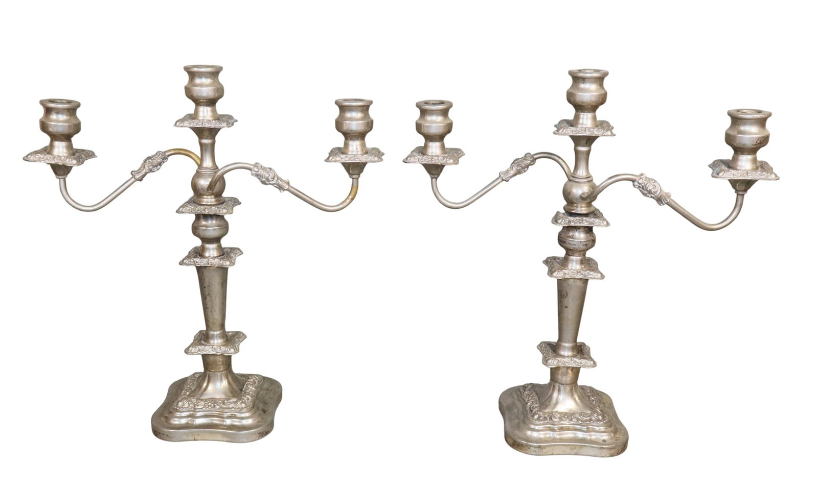Pair of 3 arm silverplate candelabra: Pair of 3 arm silverplate candelabra. 18"h x 16 1/4"w x 6"d Weight: 12lbs total