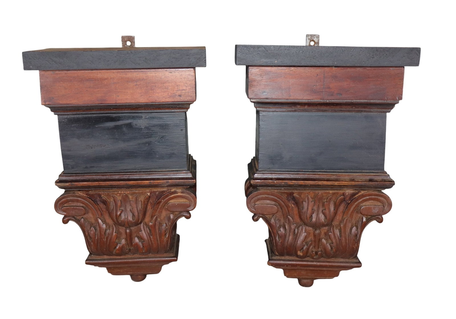 Pair of carved walnut wall shelves with acanthus leaves: Pair of carved walnut wall shelves with acanthus leaves. 12 1/2"h x 7 3/8"w x 4 1/2"d Weight: 6lbs