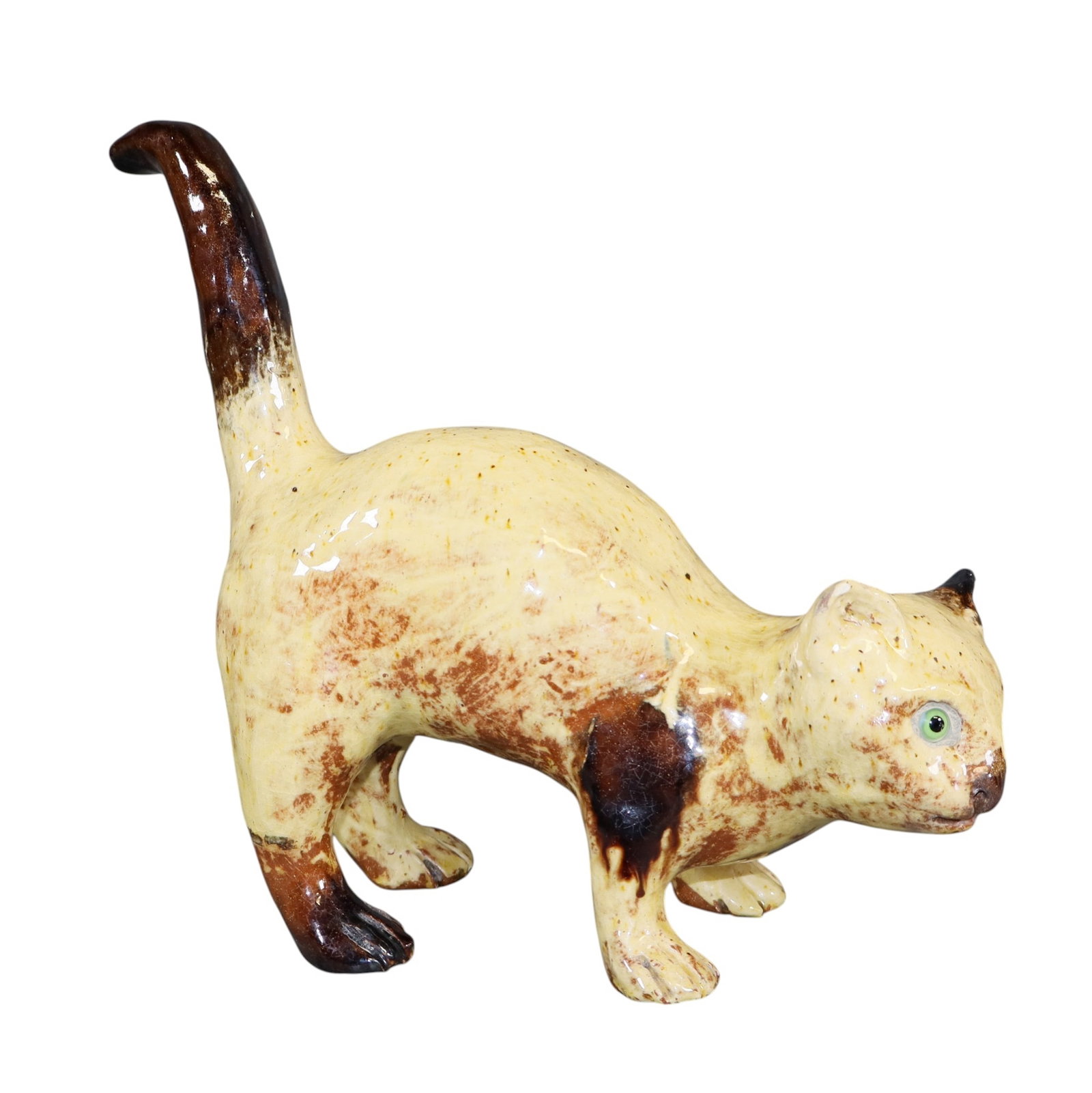 French glazed terra cotta cat figurine with glass eyes: French glazed terra cotta cat figurine with glass eyes. Makers stamp on feet. Mid 20th century. 9"h x 4"w x 10"d. Weight: 3lbs