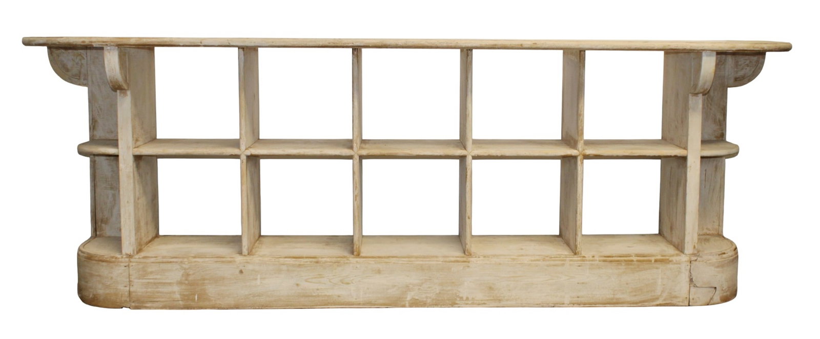 French custom store counter with cubbies from the Ralph Lauren boutique in Avignon: French custom store counter with cubbies from the Ralph Lauren boutique in Avignon France. In pine with a paint wash finish. Late 20th century. 40"h x 118"l x 23 1/2"d