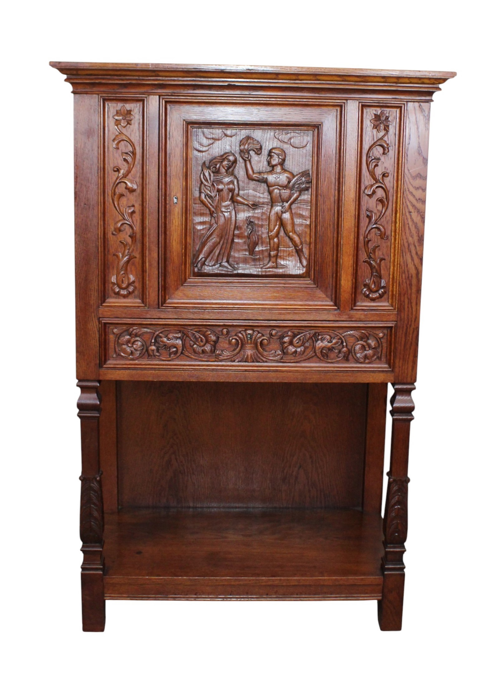 French Renaissance Revival wine cabinet in oak with relief carved Roman couple on door (1 of 8)